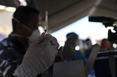 Midsection of man working