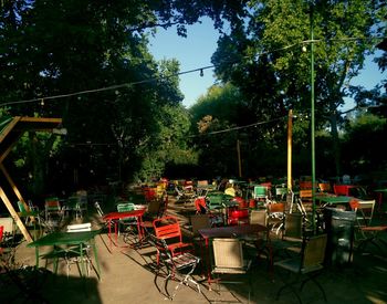 Empty chairs and tables in restaurant