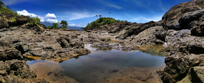 Scenic view of rocky mountains against sky