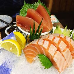 Salmon and ice on table