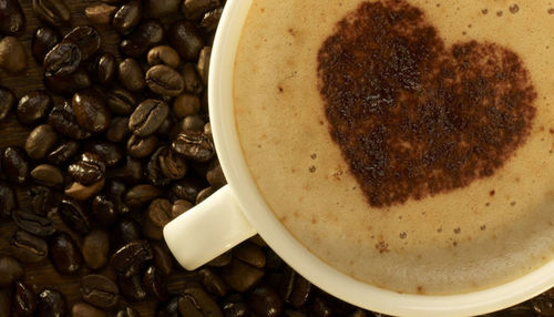 High angle view of coffee cup on table