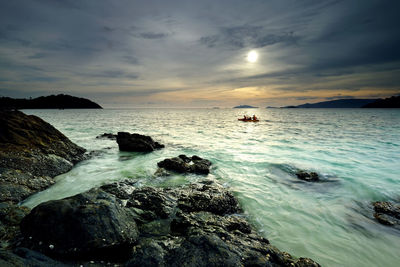 Scenic view of sea against sky during sunset