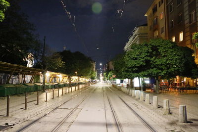 Illuminated street lights at night