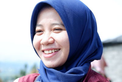 Close-up of young woman wearing hijab