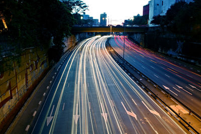 Light trails on street in city at night