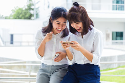 Young woman using mobile phone