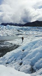 Scenic view of snow covered mountains