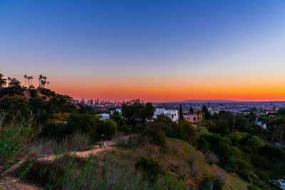 High angle view of cityscape against sky during sunset