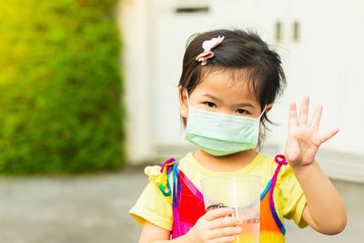 Portrait of cute boy drinking