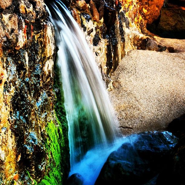 waterfall, motion, long exposure, flowing water, rock - object, water, flowing, beauty in nature, blurred motion, nature, rock formation, scenics, power in nature, forest, environment, natural landmark, geology, rock, idyllic, no people