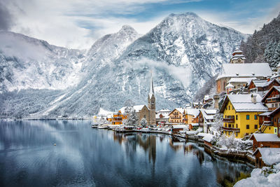 Scenic view of frozen lake against snowcapped mountain