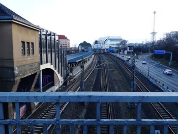 Train on railroad track against clear sky