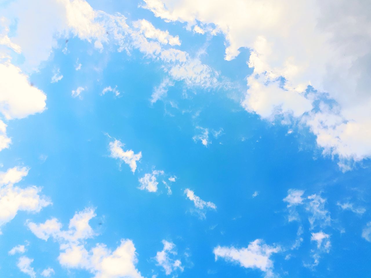 cloud - sky, sky, beauty in nature, low angle view, tranquility, scenics - nature, blue, nature, backgrounds, full frame, no people, day, tranquil scene, outdoors, idyllic, white color, sunlight, meteorology, cloudscape, atmosphere