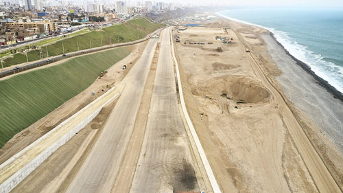 High angle view of road passing through beach