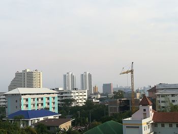 Modern cityscape against clear sky