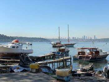 Boats moored in harbor