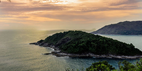 Scenic view of sea against cloudy sky