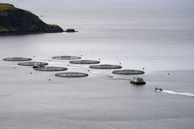 High angle view of a aqua culture farm in the ocean in scotland