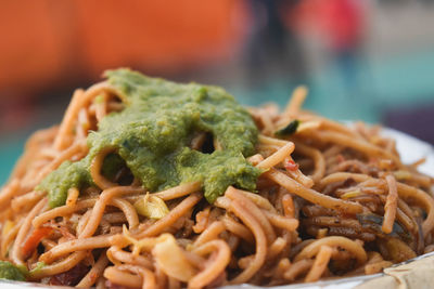 Close-up of noodles served in plate