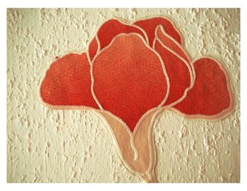 Close-up of red heart shape on table