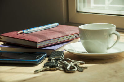 Close-up of coffee cup on table