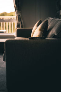 Close-up of man relaxing on seat