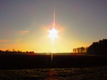 Scenic view of landscape at sunset