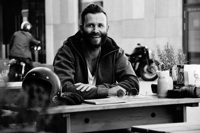 Portrait of man sitting in cafe