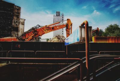 Low angle view of construction site against sky