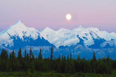 Scenic view of mountains against sky during winter