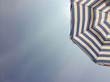 Low angle view of flag against building
