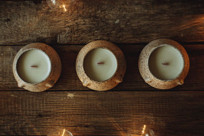 Natural candles on a wooden table