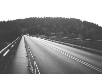 Road leading towards trees