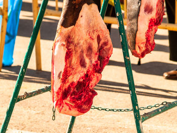 High angle view of meat on barbecue grill