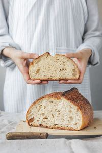 Midsection of man preparing food