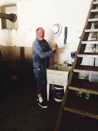 Portrait of young woman at home