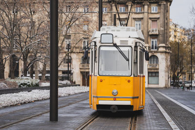 Yellow train on railroad track