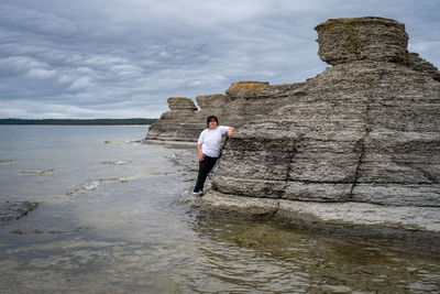 Limestone formation at a baltic sea coast against a dramatic sky