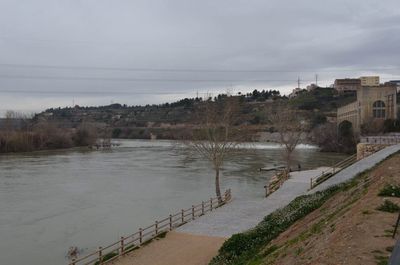 View of river against cloudy sky