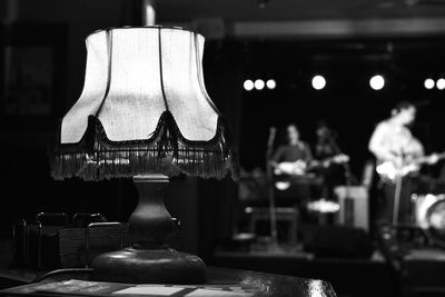 Close-up of illuminated lamp at home