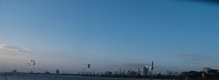 Panoramic view of city buildings against sky