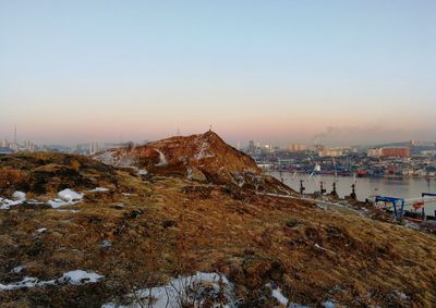 Panoramic view of cityscape against clear sky during sunset