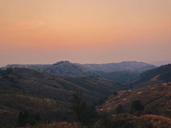 Scenic view of mountains against sky during sunset