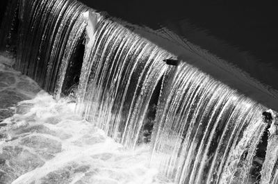 Close-up of water flowing from dam