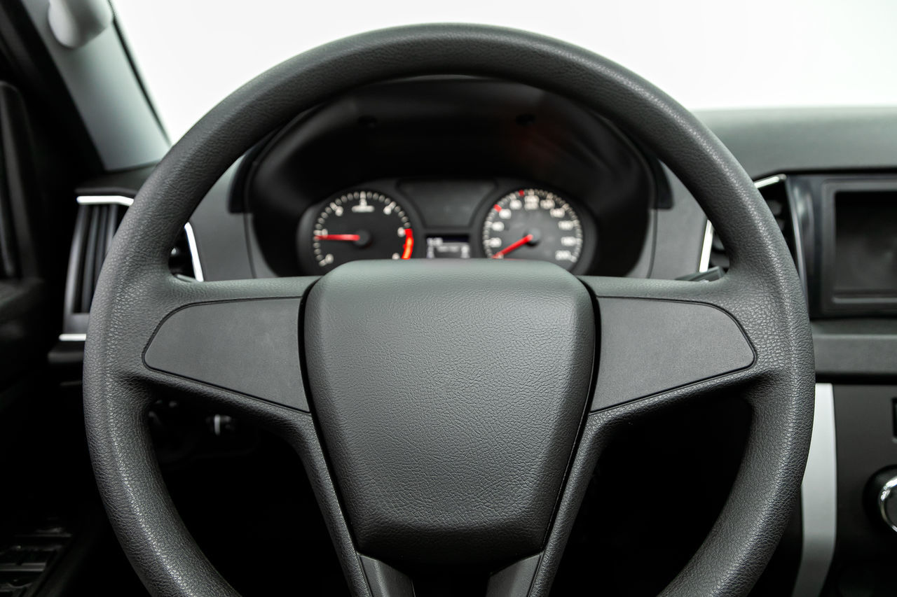 CLOSE-UP OF VINTAGE CAR ON MACHINE