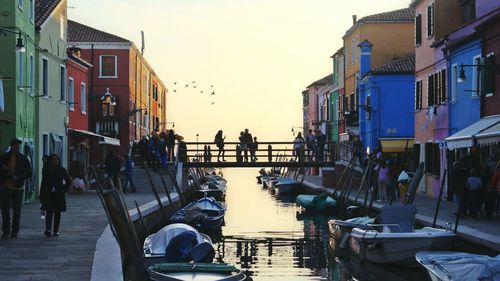 People walking in canal