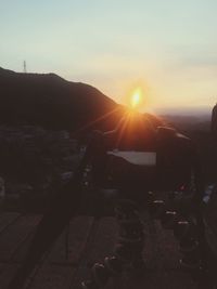 Silhouette mountains against sky during sunset