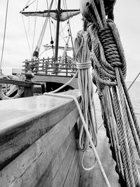 View of sailboats moored at harbor