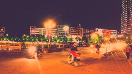 View of illuminated city at night