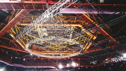 Low angle view of illuminated ferris wheel